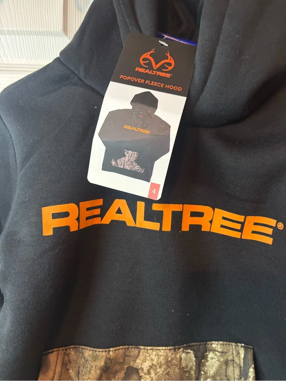 Realtree Kids Black Hoodie with Orange Logo and Camouflage Pocket